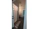 Bathroom featuring a shower with modern tile, open door and tiled floor at 4267 Klondike Rd, Lithonia, GA 30038