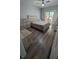 Bedroom featuring wood floors, bed, and dresser at 4267 Klondike Rd, Lithonia, GA 30038