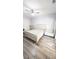Bedroom with wood floors, bed, and dresser at 4267 Klondike Rd, Lithonia, GA 30038