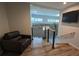 Hallway landing featuring wooden floors, metal railings and stairs at 4267 Klondike Rd, Lithonia, GA 30038