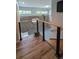 Open landing featuring modern railings and a view of the living room at 4267 Klondike Rd, Lithonia, GA 30038