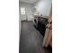 Laundry room featuring washer, dryer, tile flooring, storage and sink at 4267 Klondike Rd, Lithonia, GA 30038
