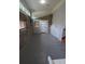 Living room featuring a stone wall, modern door, and an open floor plan at 4267 Klondike Rd, Lithonia, GA 30038