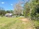Property view of yard with chain link fence at 4267 Klondike Rd, Lithonia, GA 30038