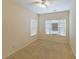 Bright bedroom with a ceiling fan and two windows bringing in lots of natural light at 1211 Grampian Pass # 15, Marietta, GA 30008
