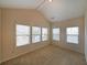 Bedroom features neutral walls, carpeting, and a window with blinds allowing for natural light at 1211 Grampian Pass # 15, Marietta, GA 30008
