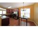 Dining area with hardwood floors, natural light, and view of the kitchen at 1211 Grampian Pass # 15, Marietta, GA 30008