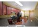 Kitchen with stainless steel appliances, ample counter space, and hardwood floors at 1211 Grampian Pass # 15, Marietta, GA 30008