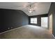 Spacious main bedroom featuring vaulted ceiling, neutral carpet, and ample natural light at 1211 Grampian Pass # 15, Marietta, GA 30008