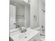 Well-lit bathroom with modern sink, vanity, and subway tile shower at 214 Maple St, Atlanta, GA 30354