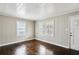 Well-lit living room with hardwood floors and freshly painted walls at 214 Maple St, Atlanta, GA 30354