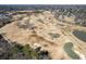 Aerial view of golf course, walking paths, water features and mature trees at 382 Golfview Nw Rd, Atlanta, GA 30309