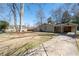 Charming single-story home with a well-maintained lawn and driveway at 382 Golfview Nw Rd, Atlanta, GA 30309