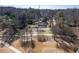 Scenic view of the home in a quiet neighborhood, surrounded by lush trees at 382 Golfview Nw Rd, Atlanta, GA 30309