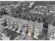 An aerial view highlights the brick townhouse among a community setting at 2959 Rivergreen Se Ln, Atlanta, GA 30339