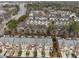Aerial view of a community of townhouses situated near a major highway at 2959 Rivergreen Se Ln, Atlanta, GA 30339