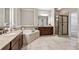 Large bathroom featuring a soaking tub, double vanity, and walk-in shower at 2959 Rivergreen Se Ln, Atlanta, GA 30339