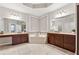 Large bathroom featuring dual sink vanity, soaking tub and tiled floors at 2959 Rivergreen Se Ln, Atlanta, GA 30339