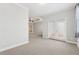 Bedroom with neutral walls, baseboards, and carpet and access to a balcony at 2959 Rivergreen Se Ln, Atlanta, GA 30339