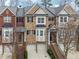 Classic brick townhome with symmetrical design elements and inviting front entrances at 2959 Rivergreen Se Ln, Atlanta, GA 30339