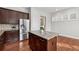 Bright kitchen featuring stainless steel appliances, dark cabinetry, and a granite island at 2959 Rivergreen Se Ln, Atlanta, GA 30339