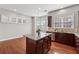 Charming kitchen with granite counters, dark cabinets, and stainless steel appliances at 2959 Rivergreen Se Ln, Atlanta, GA 30339