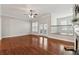 Living room featuring hardwood floors, bright windows, and a cozy fireplace at 2959 Rivergreen Se Ln, Atlanta, GA 30339