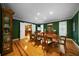 Formal dining room with beautiful floors and plenty of space for entertaining guests during the holidays at 5525 Whitner Dr, Sandy Springs, GA 30327