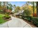 Charming one-story home with lush landscaping and a long driveway surrounded by mature trees at 5525 Whitner Dr, Sandy Springs, GA 30327