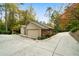 Spacious garage with a wide driveway, providing ample parking and easy access at 5525 Whitner Dr, Sandy Springs, GA 30327