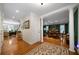 Bright hallway leading into the house, flowing to the living room, dining room, and an elegant staircase at 5525 Whitner Dr, Sandy Springs, GA 30327