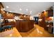 Spacious kitchen boasts custom wood cabinetry, granite countertops, and modern appliances, perfect for culinary enthusiasts at 5525 Whitner Dr, Sandy Springs, GA 30327