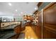 Gourmet kitchen with stainless steel appliances, custom cabinets, and breakfast bar overlooking the sunny backyard at 5525 Whitner Dr, Sandy Springs, GA 30327