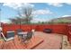 Charming patio area with red brick pavers, seating, and well-defined space for outdoor enjoyment at 2403 Brianna Dr, Hampton, GA 30228