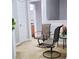 Cozy sitting area featuring comfortable chairs and neutral decor, perfect for relaxation and reading nook at 2403 Brianna Dr, Hampton, GA 30228