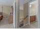 Upstairs hallway leading to bathroom; bedroom visible in background at 1258 Mcallistar Dr, Locust Grove, GA 30248