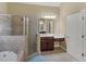 Well-lit bathroom with a separate shower, jetted tub, and vanity with plenty of storage at 1258 Mcallistar Dr, Locust Grove, GA 30248