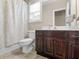 Bathroom with tub and shower combination and dark brown vanity with white countertop at 1258 Mcallistar Dr, Locust Grove, GA 30248