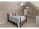 Attic bedroom with neutral paint and carpet with dormer ceilings at 1258 Mcallistar Dr, Locust Grove, GA 30248