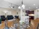 Open concept dining area with hardwood floors and views into other rooms at 1258 Mcallistar Dr, Locust Grove, GA 30248