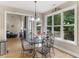 Dining area with access to the deck and views of the yard at 1258 Mcallistar Dr, Locust Grove, GA 30248