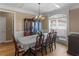 Elegant dining room with hardwood floors and natural light at 1258 Mcallistar Dr, Locust Grove, GA 30248