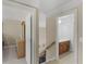 Hallway with a view of the second floor leading to the bedroom and bathroom at 1258 Mcallistar Dr, Locust Grove, GA 30248