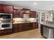 Gourmet kitchen with stainless steel appliances and granite countertops at 1258 Mcallistar Dr, Locust Grove, GA 30248
