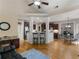 Open floor plan featuring a combined living room, dining area, and kitchen with hardwood floors at 1258 Mcallistar Dr, Locust Grove, GA 30248