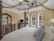 The main bedroom boasts a trey ceiling and lots of windows for plenty of natural light at 1258 Mcallistar Dr, Locust Grove, GA 30248