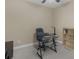 This home office has ample natural light and neutral tones to maximize productivity at 1258 Mcallistar Dr, Locust Grove, GA 30248