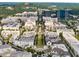 High aerial view featuring a blend of residential neighborhoods, commercial buildings, and tree-lined streets at 364 Concord St, Alpharetta, GA 30009