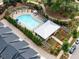 Aerial view of community pool, clubhouse, and landscaping at 364 Concord St, Alpharetta, GA 30009