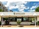 Welcoming Avalon valet entrance with clear signage, manicured landscaping, and modern architectural details at 364 Concord St, Alpharetta, GA 30009